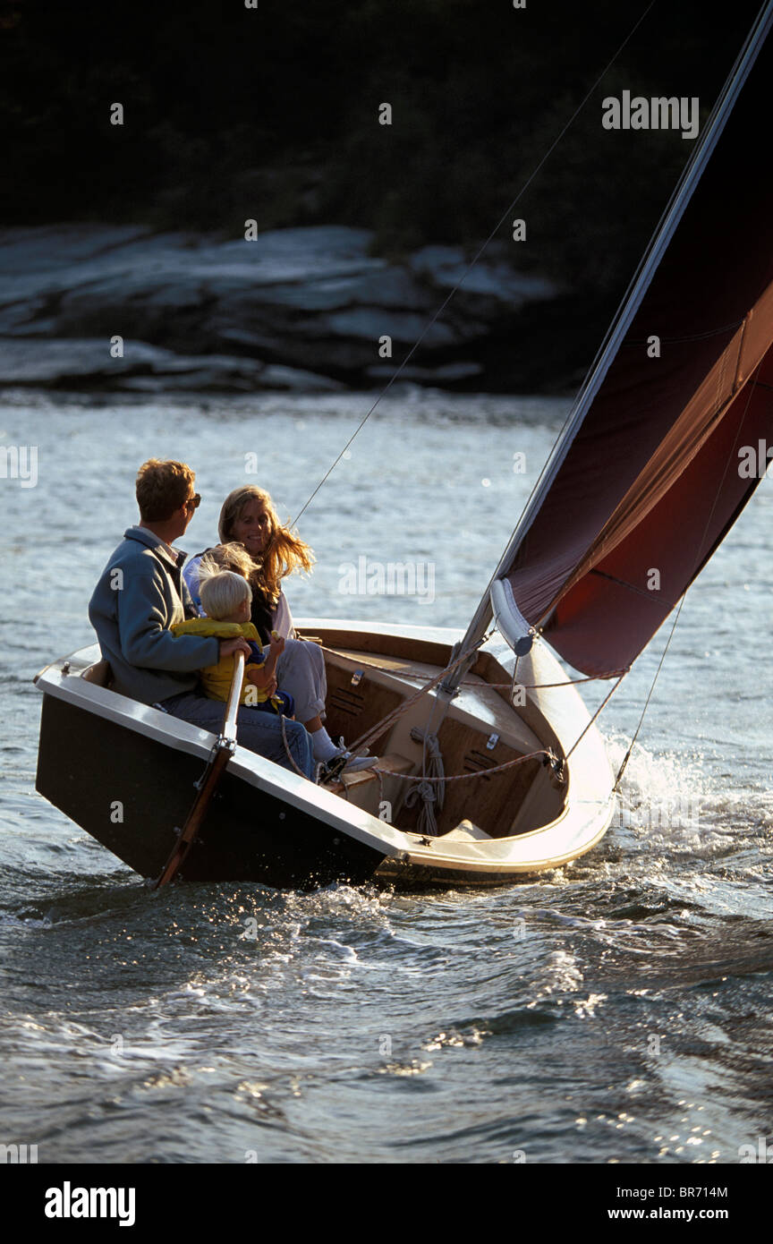 Family sailing a Point Jude sailing dinghy in Newport, Rhode Island