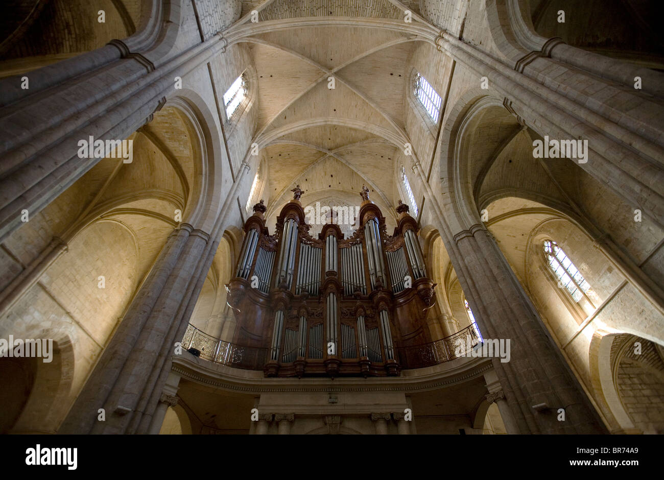 Large organ purched high in a large church in Saint Maiximin France. Stock Photo