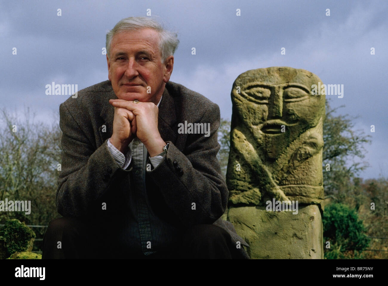 Personalities, John Montague Beside Janus, Stone Co Fermanagh Stock Photo