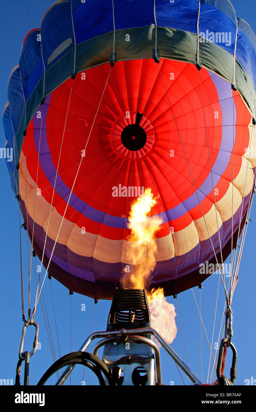 Close-up view of a colorful hot air balloon being inflated with hot air Stock Photo