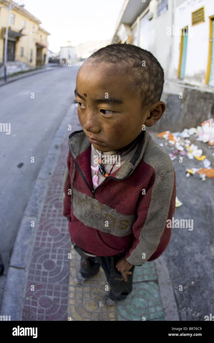 Local boy on street Tibet Stock Photo - Alamy