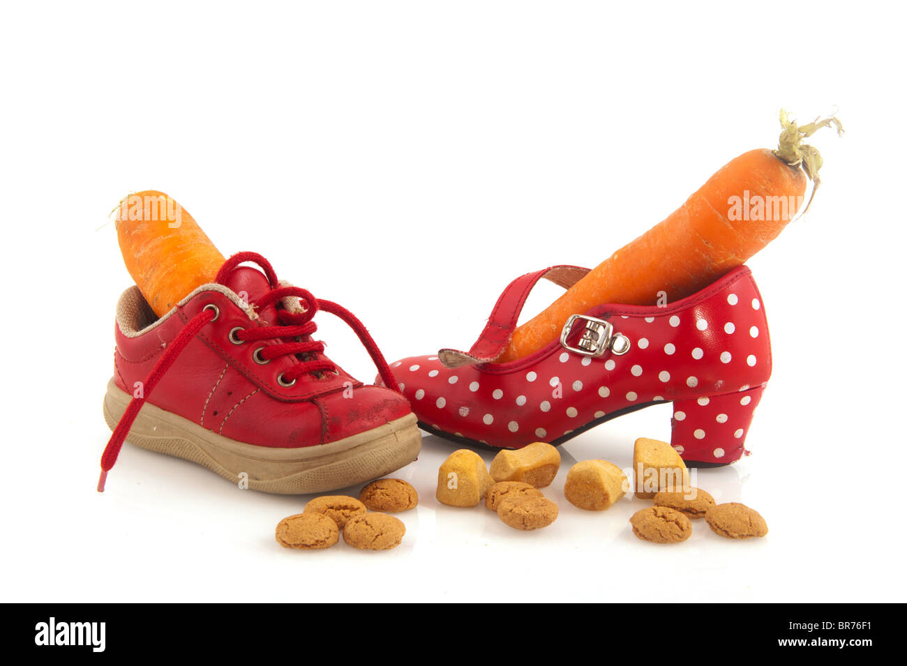 Shoes with carrots for horse of Sinterklaas and isolated over white Stock -