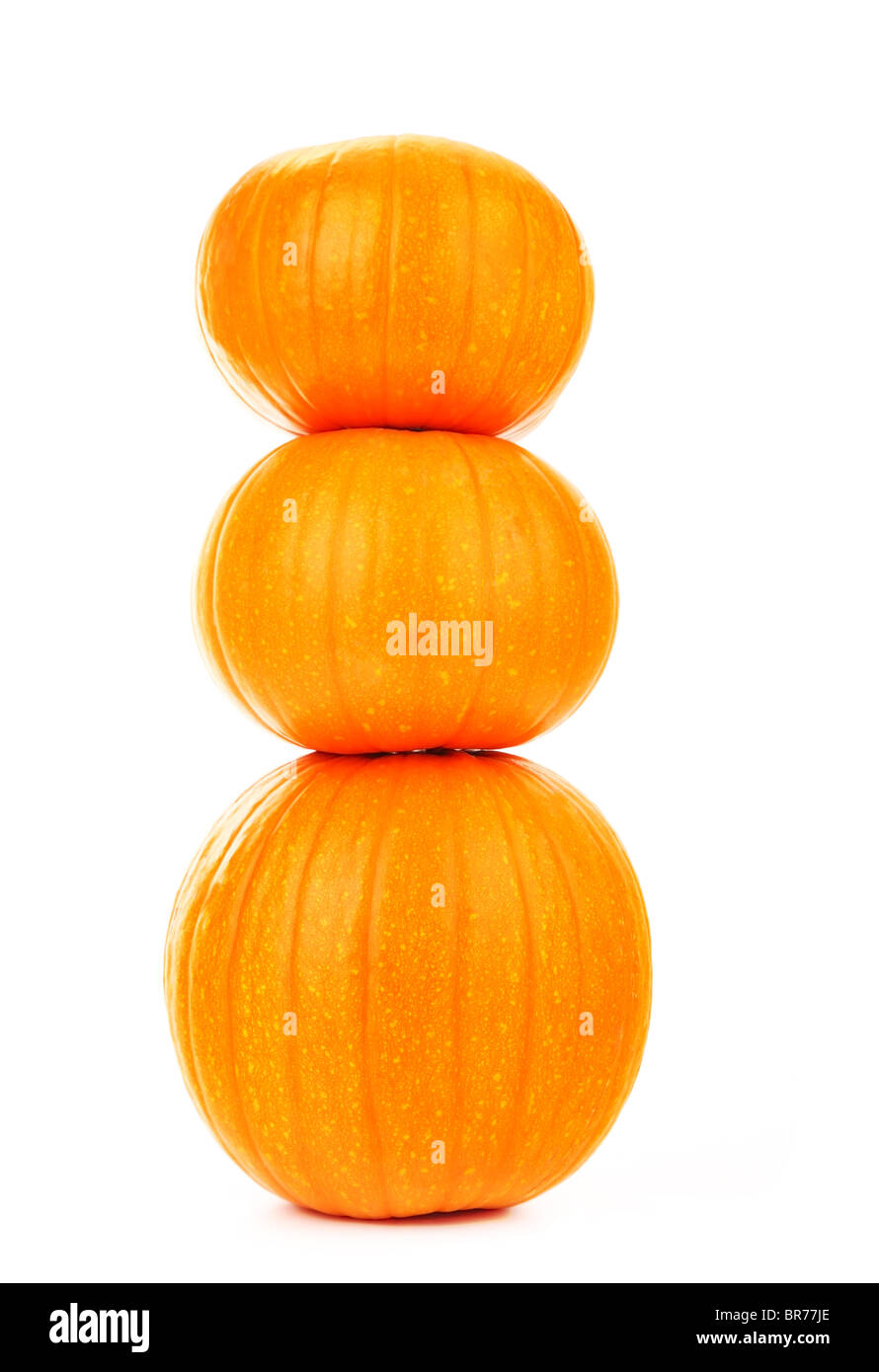 Three pumpkins isolated on white background Stock Photo - Alamy