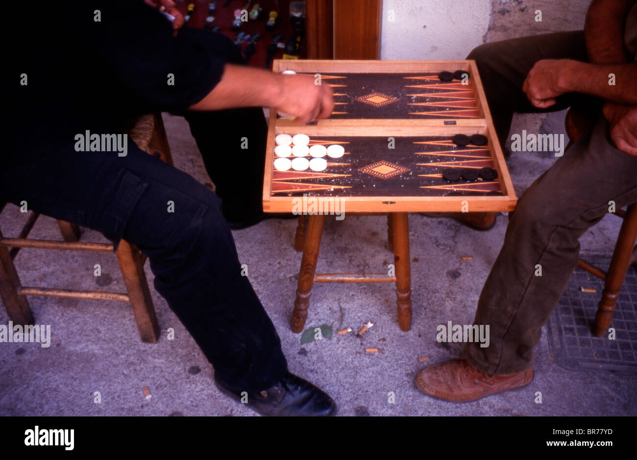Men play backgammon in Rethymnon Crete. Stock Photo