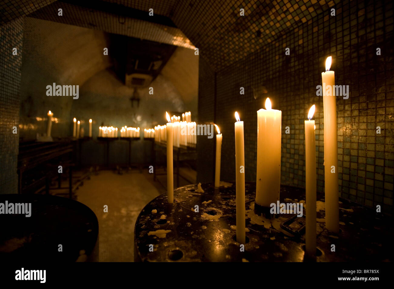 Candles in a dark room Stock Photo Alamy