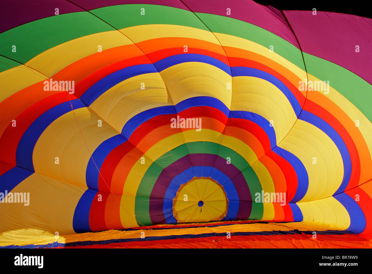 Inside of a colorful hot air balloon during inflation Stock Photo