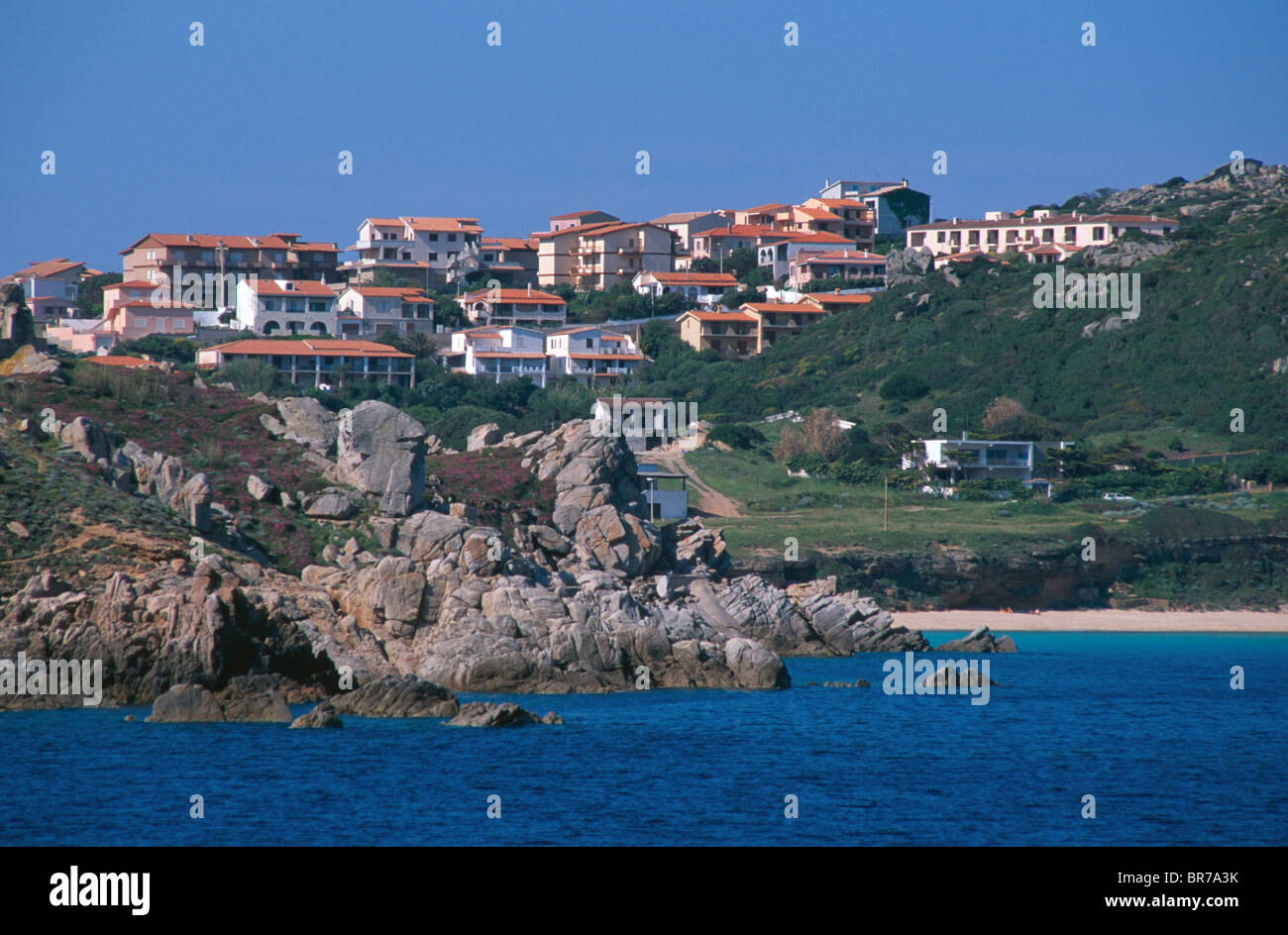 Homes above Rena Bianca beach near Santa Teresa di Gallura, Sardinia, Italy. Stock Photo