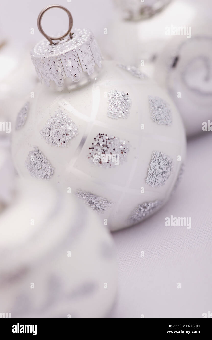 A White And Silver Christmas Ball; Edmonton, Alberta, Canada Stock Photo