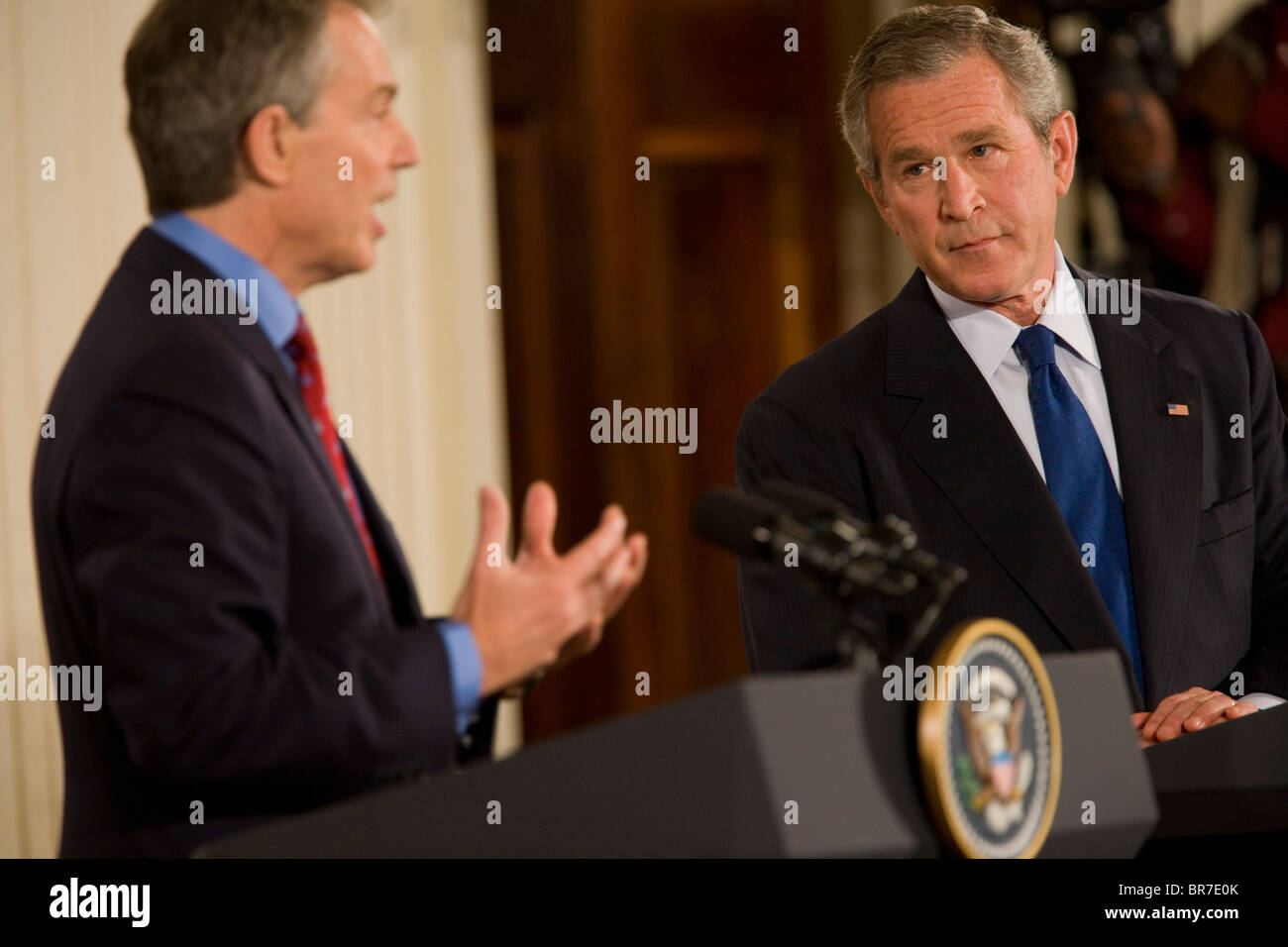 President Bush speaks to reporters along side Britain's Tony Blair Stock Photo