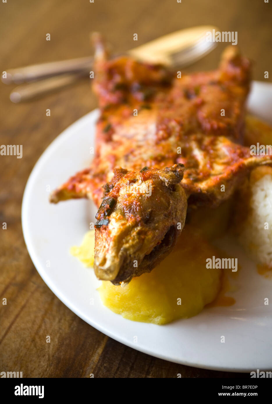 Roast Cuy or Guinea Pig served in a restaurant in Lima Peru -  An example of the strange or weird food eaten by people around the world Stock Photo