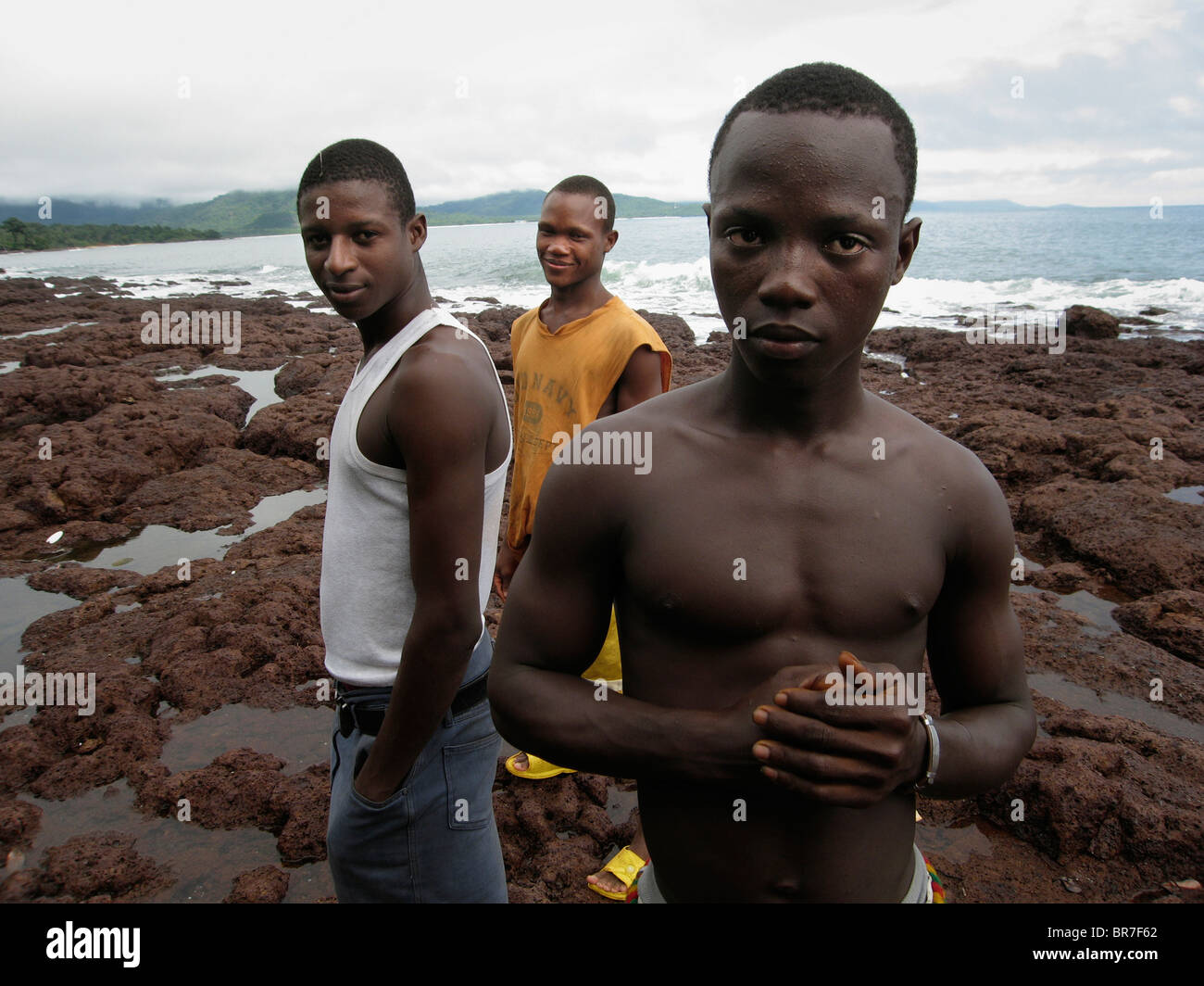Yound Sierra Leonean men looking tough on the beach Stock Photo