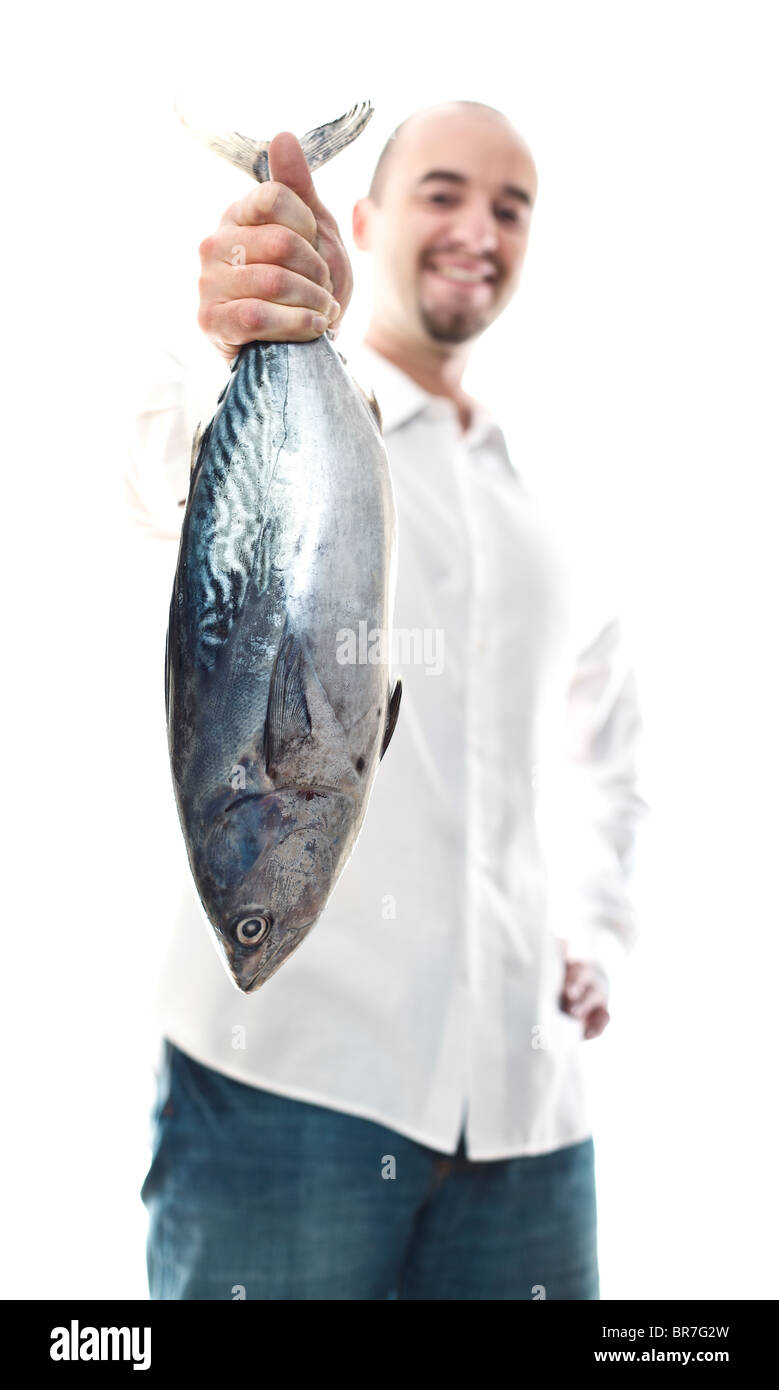 caucasian man hold big tuna fish in his hand selective focus Stock Photo