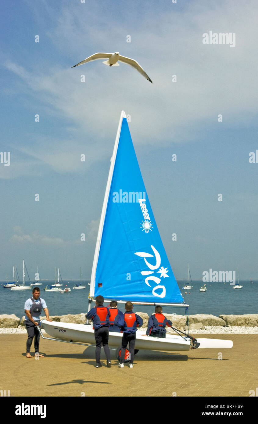 Young people sail training with a Laser Pico sailing dinghy at Weymouth
