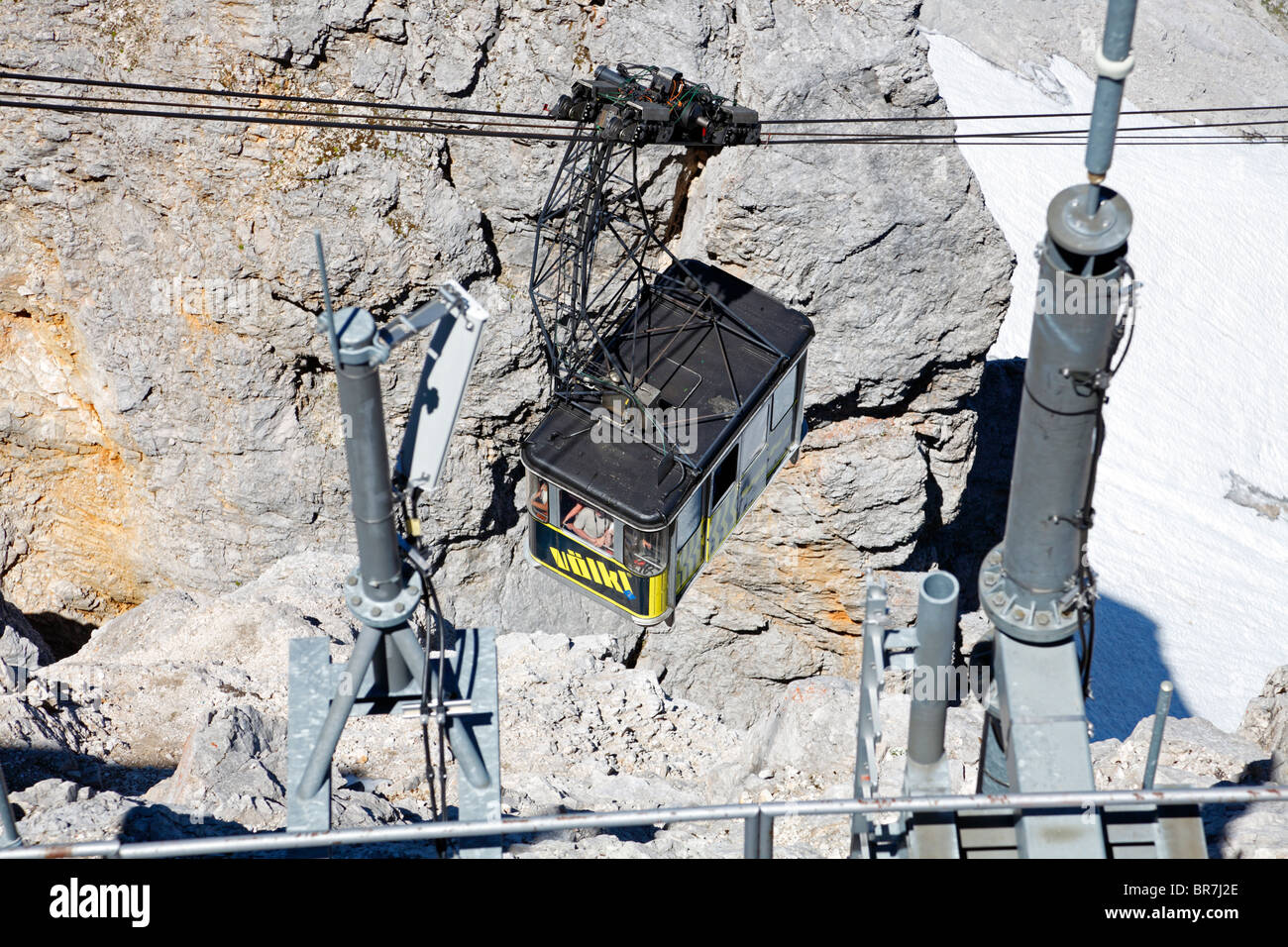 Gondola arriving to the cable car station at the summit of Zugspitze, Bavaria, Germany Stock Photo