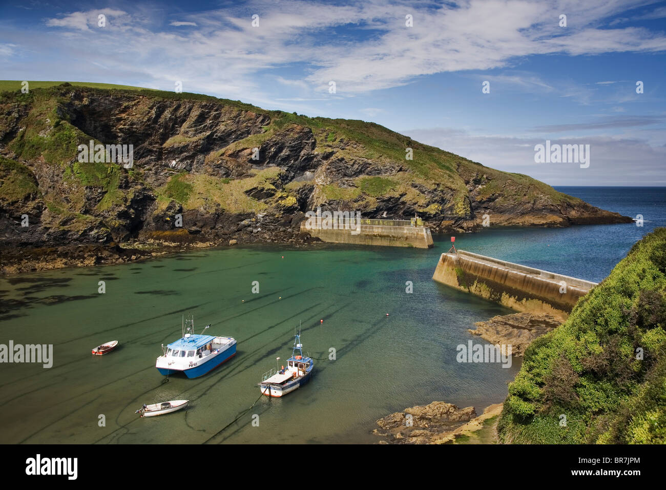 Picture postcard view of the harbour at the traditional Cornish fishing village of Port Isaac Cornwall UK Stock Photo