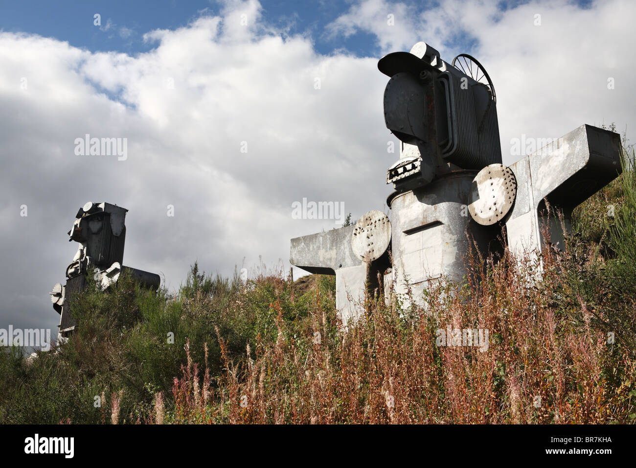 Old Transformers by David Kemp. Two sculptures on the coast to coast (C2C) cycle route near Pontop Pyke, England, UK. Stock Photo