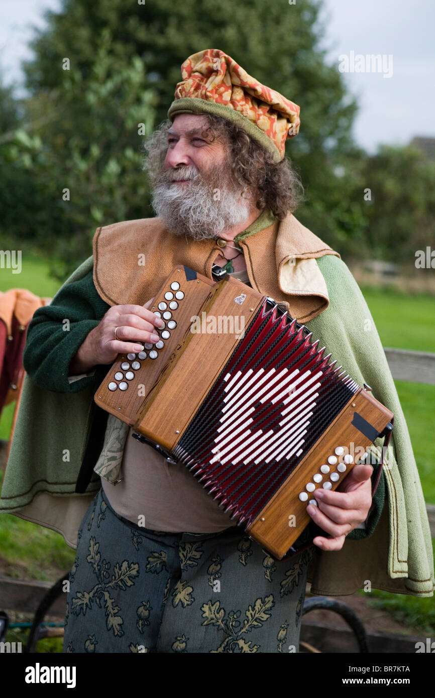 Accordian player performing at the Abott's Bromley Horn Dance, Staffordshire, England, UK Stock Photo