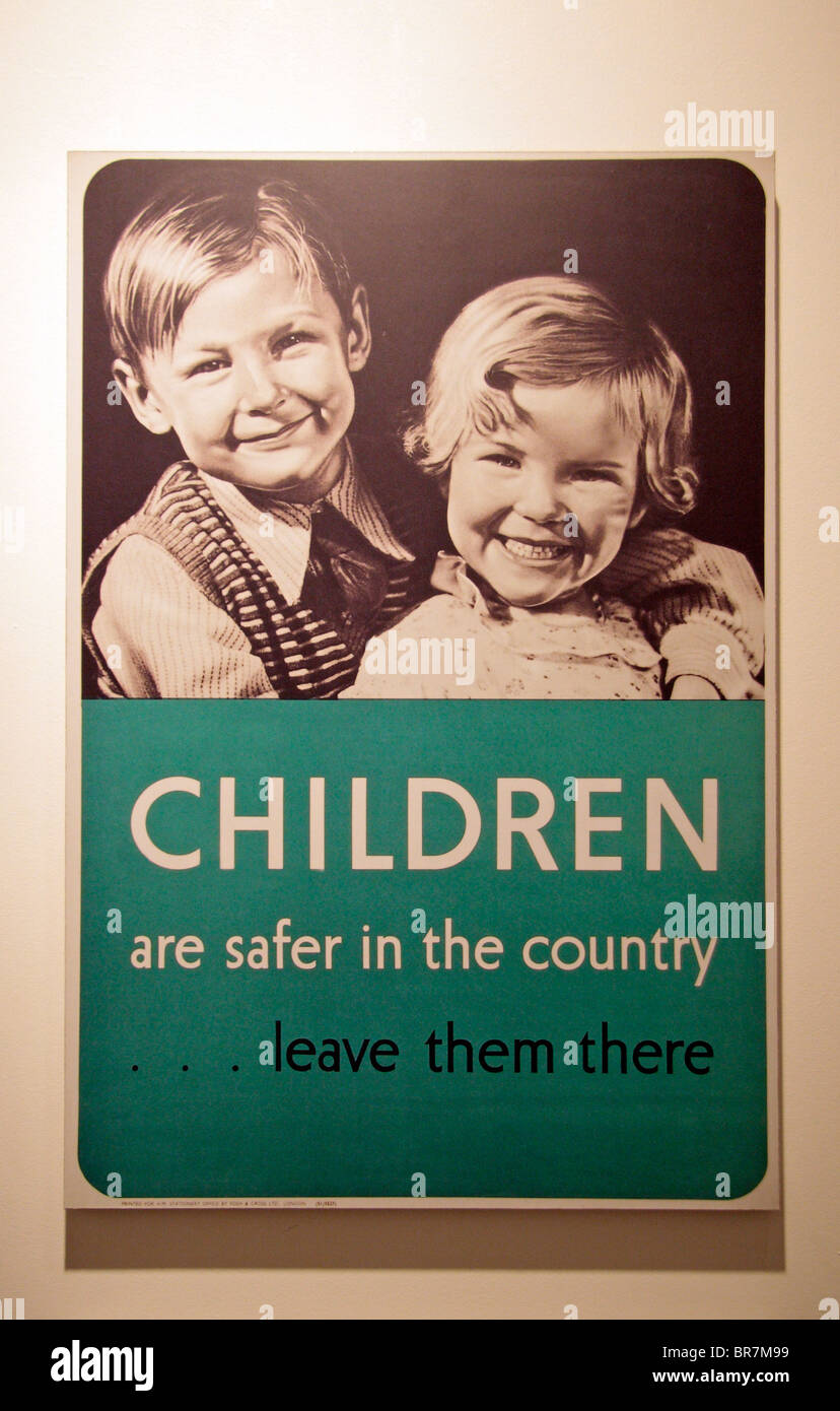 'Children are safer in the country...leave them there' poster from World War Two on display, Imperial War Museum, London, UK. Stock Photo
