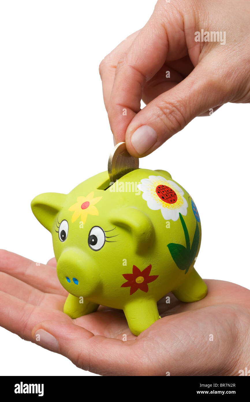 coin in a piggy bank Stock Photo - Alamy
