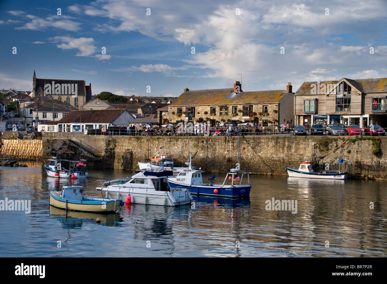 Boats in the harbour at Porthleven in Cornwall, England Stock Photo