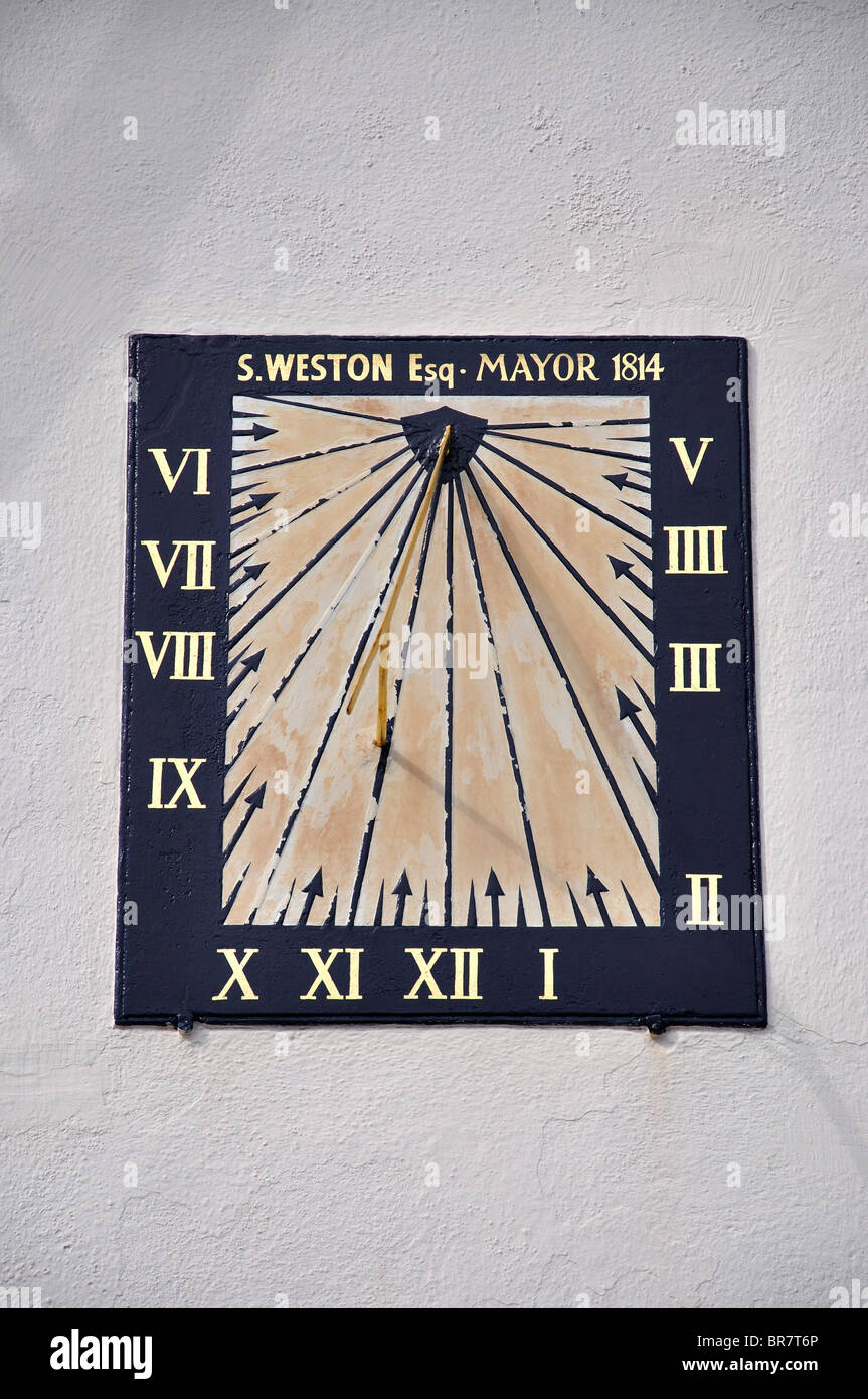 Ancient sundial on HM.Coastguard Building, The Quay, Poole, Dorset, England, United Kingdom Stock Photo