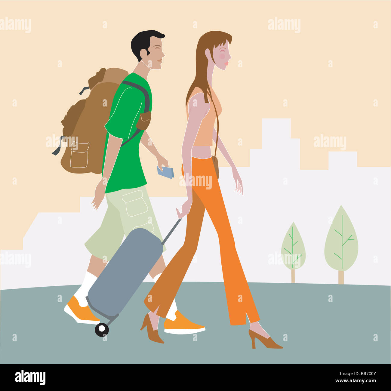 Man and woman walking with luggage Stock Photo