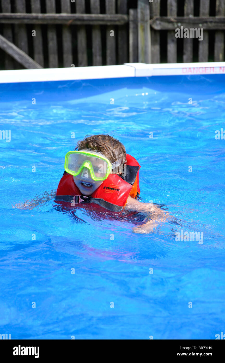 Little boy swimming in pool Stock Photo Alamy