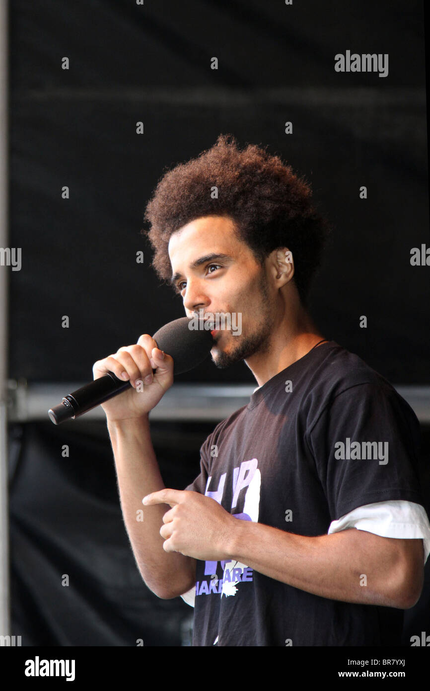 Rapper Kingslee James Daley, The Black Shakespeare singing into ...