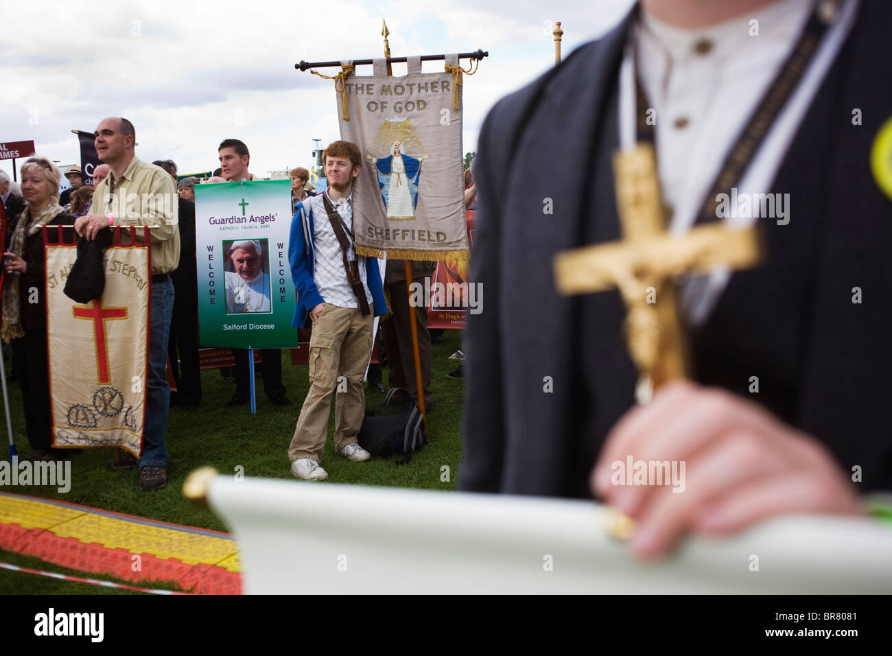 Local Catholic church groups with banners await the start of the Hyde Park rally during Pope Benedict XVI's papal tour of UK Stock Photo