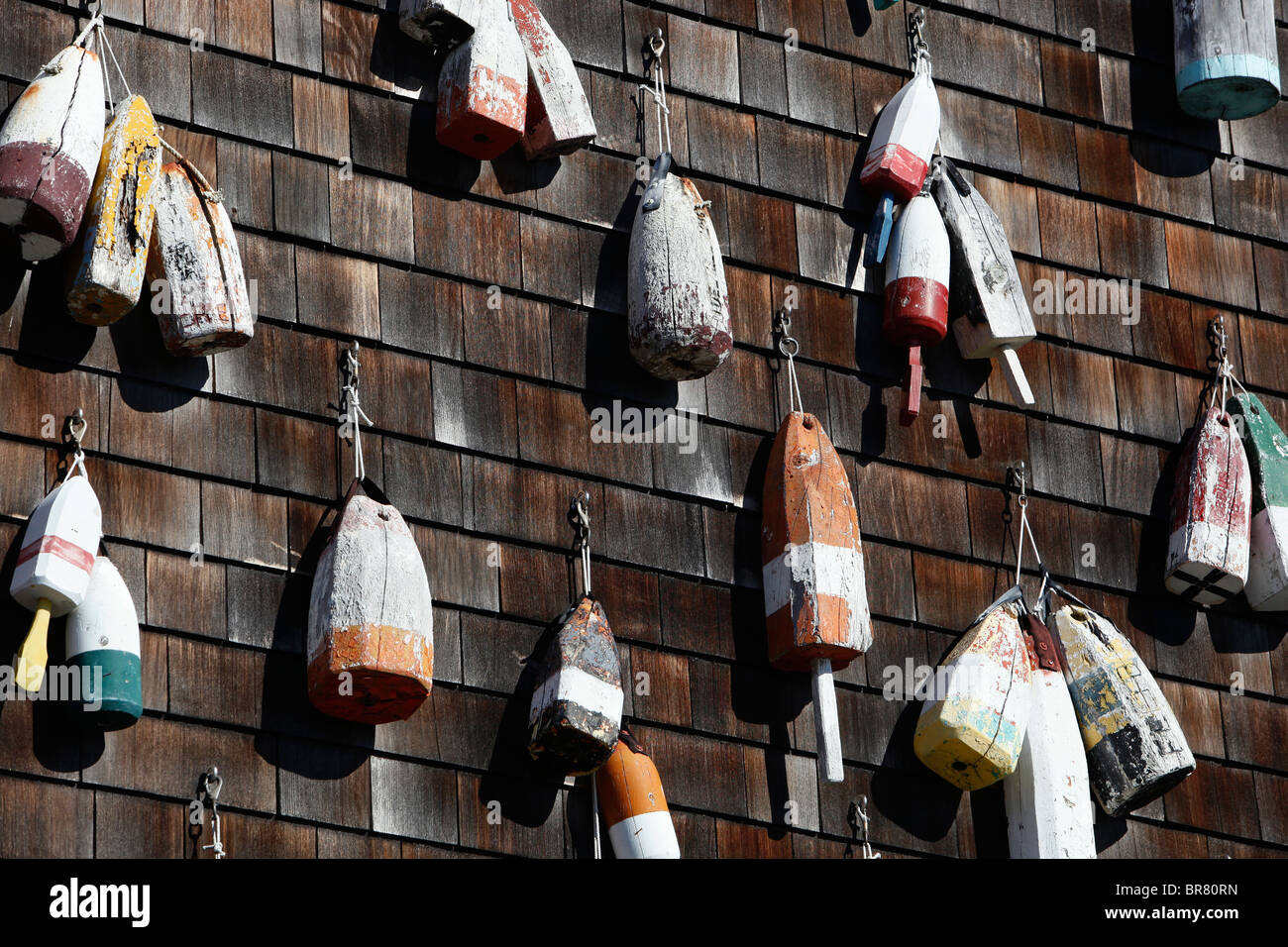 Lobster buoys on wall, Sag Harbor, New York Stock Photo