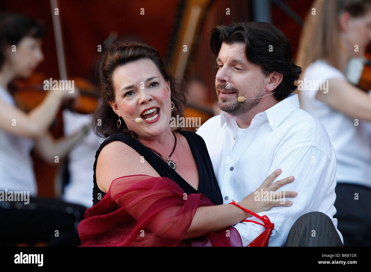 Jill Gardner and Richard Crawley perform a piece from Tosca with the Boston Landmarks Orchestra at the Hatch Shell in Boston Stock Photo
