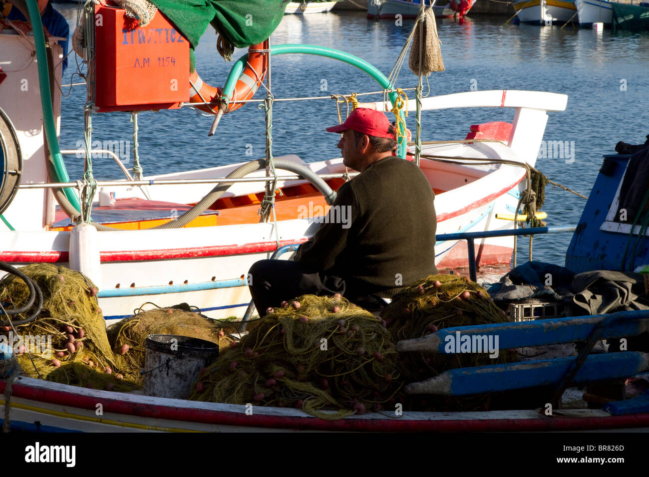 Fishing boats and fisherman Skala Kallonis Harbour Lesvos Stock Photo