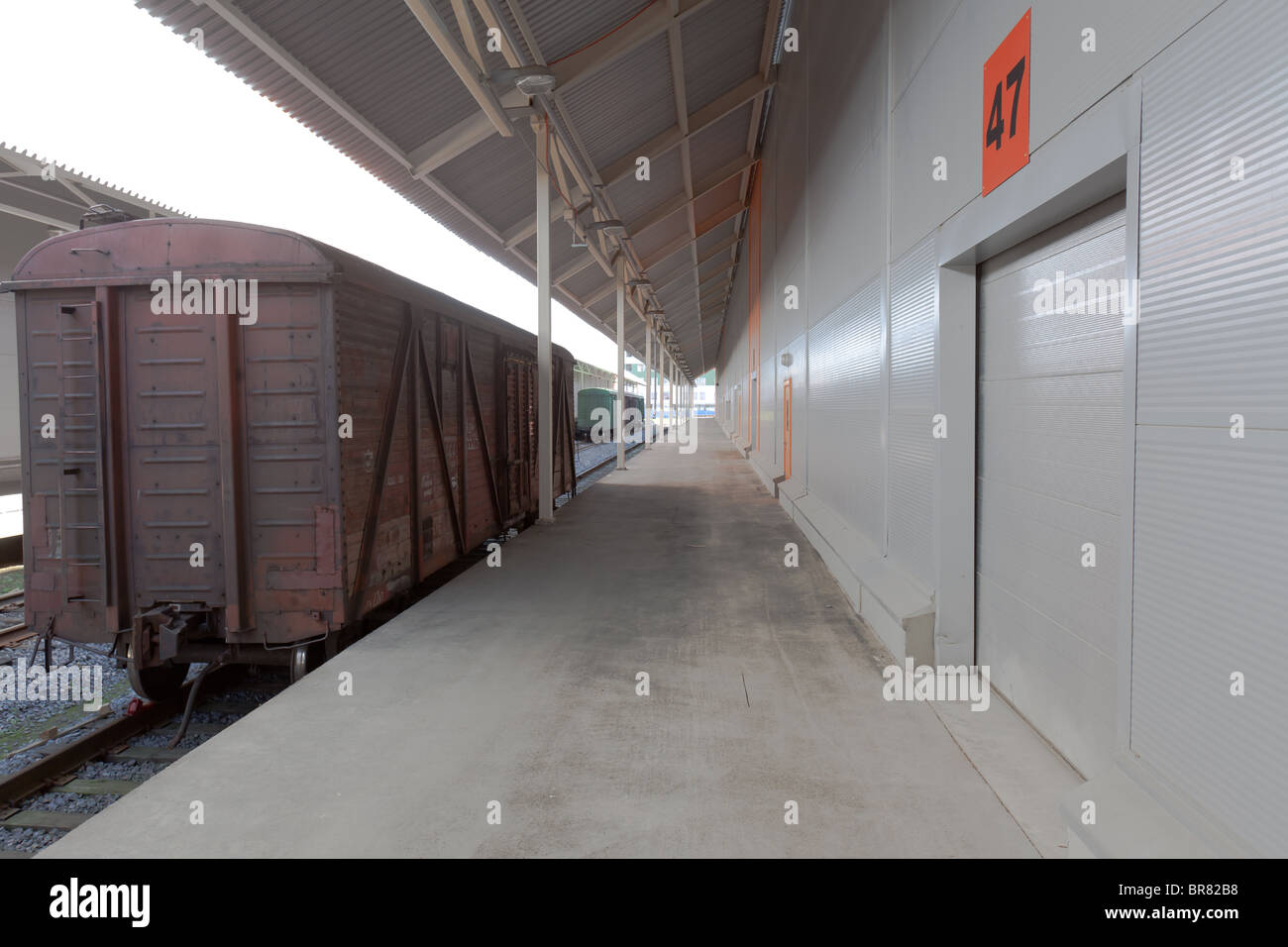 Boxcar is at the loading terminal. Stock Photo