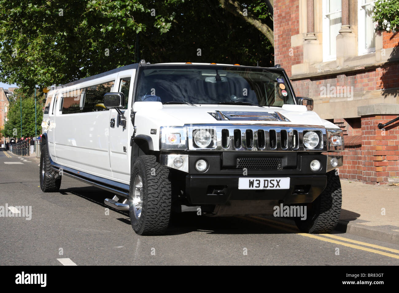 A Hummer stretch limousine on a U.K. street. Stock Photo