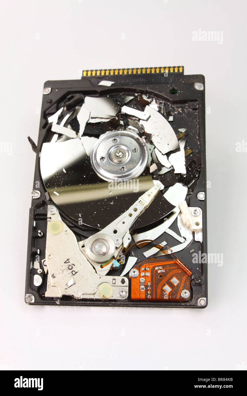 Smashed computer hard disc drive Stock Photo