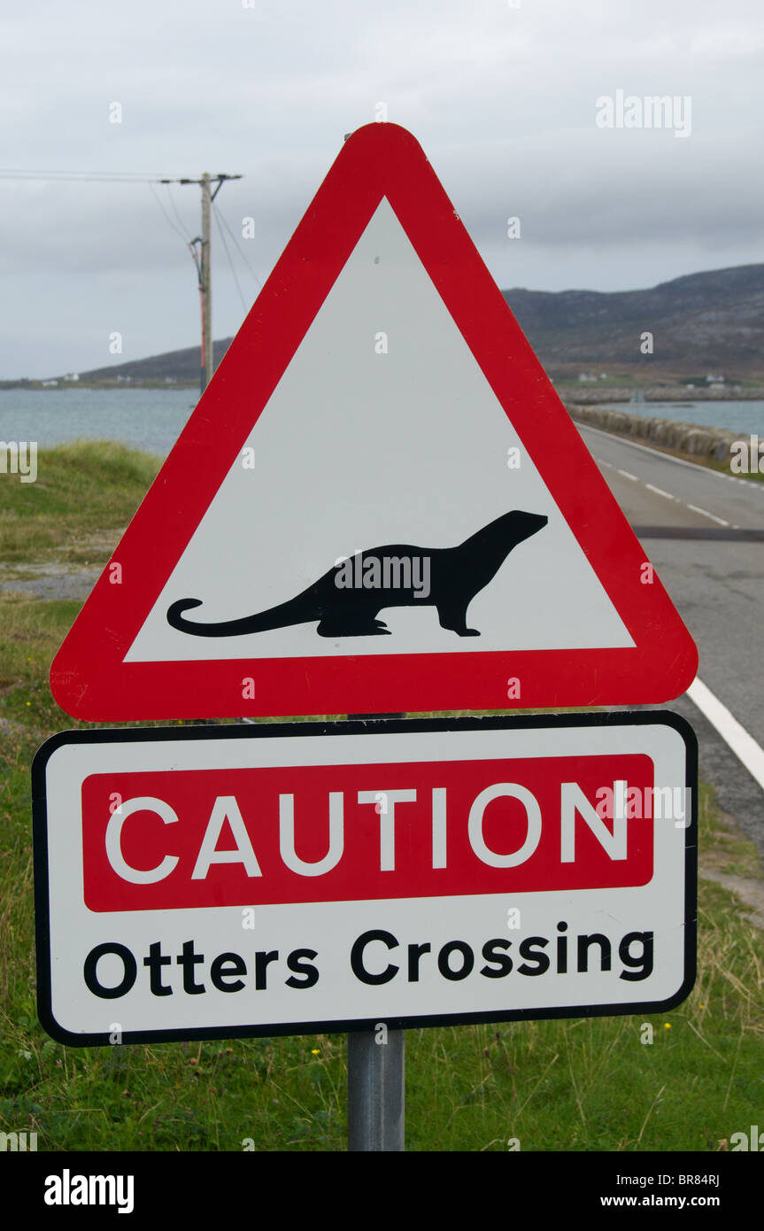 ‘Otters Crossing’ road sign at causeway from Eriskay to South Uist in the Outer Hebrides, Scotland Stock Photo