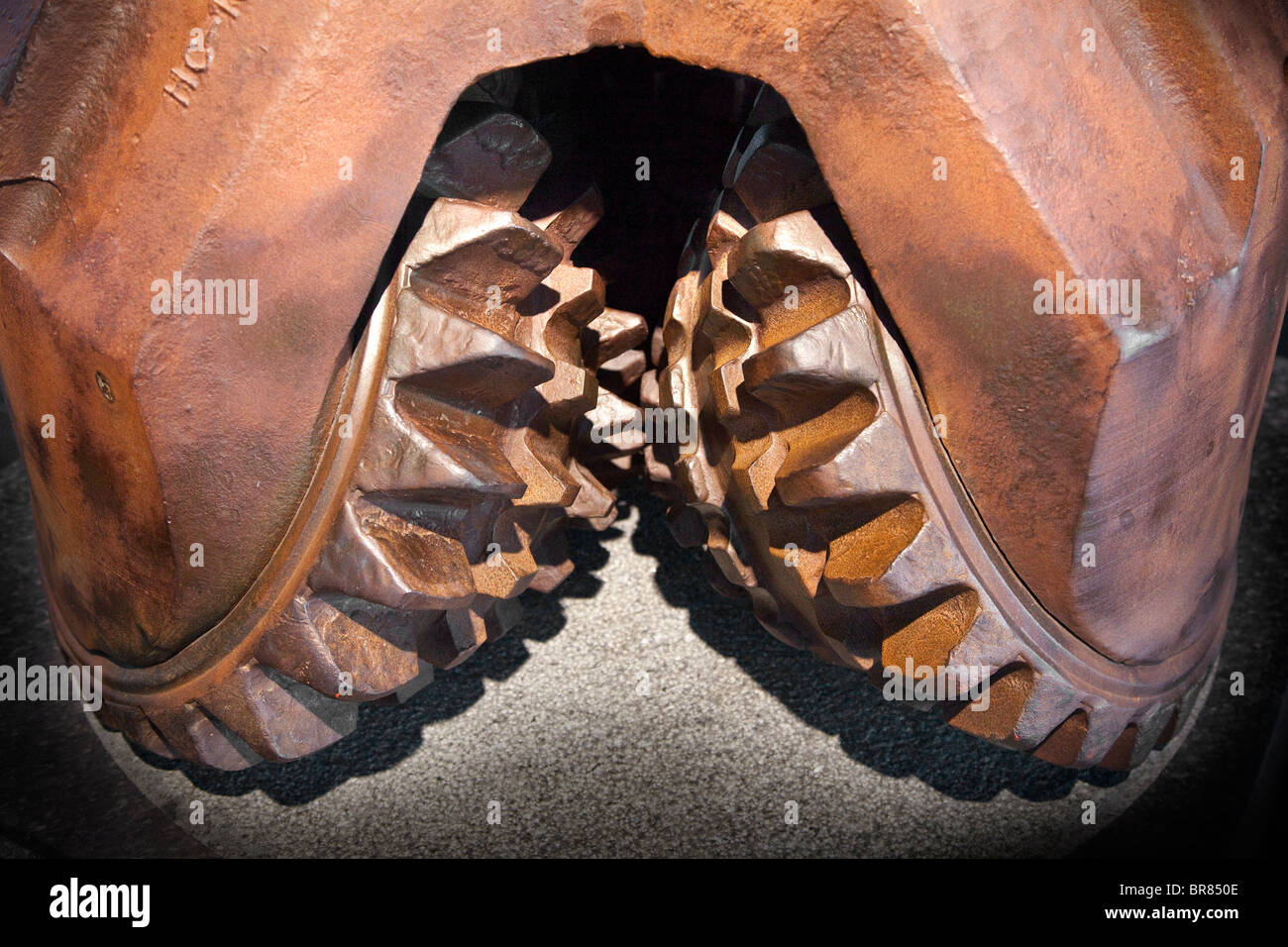 Oil drill bit detail of serated wheels which turn during drilling Stock Photo
