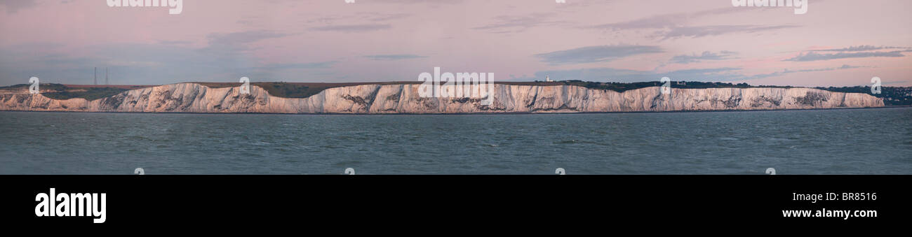 The white cliffs of Dover, panorama viewed from the English Channel, sunrise, warm light Stock Photo