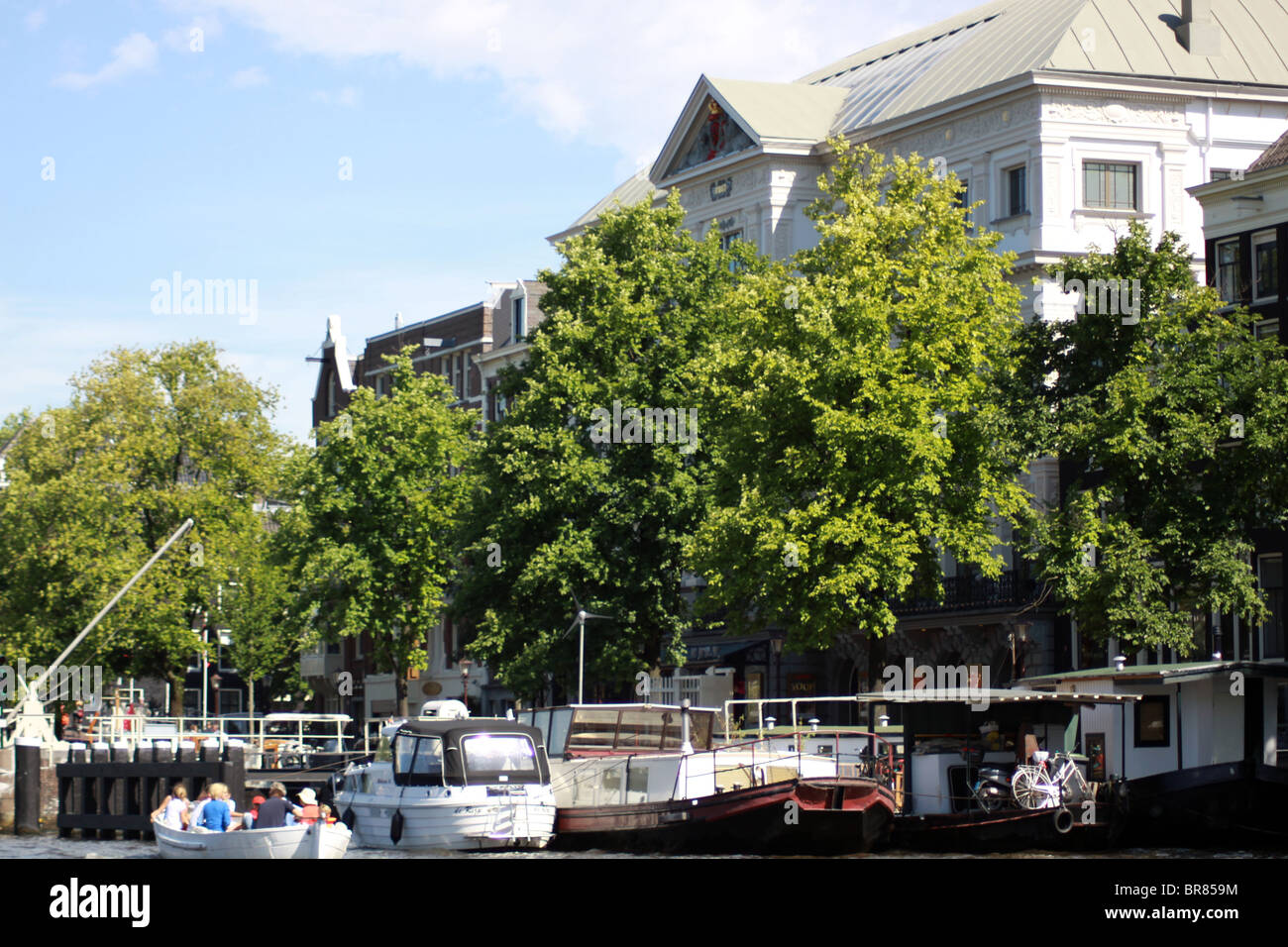 Amsterdam canal side hotel boats Stock Photo