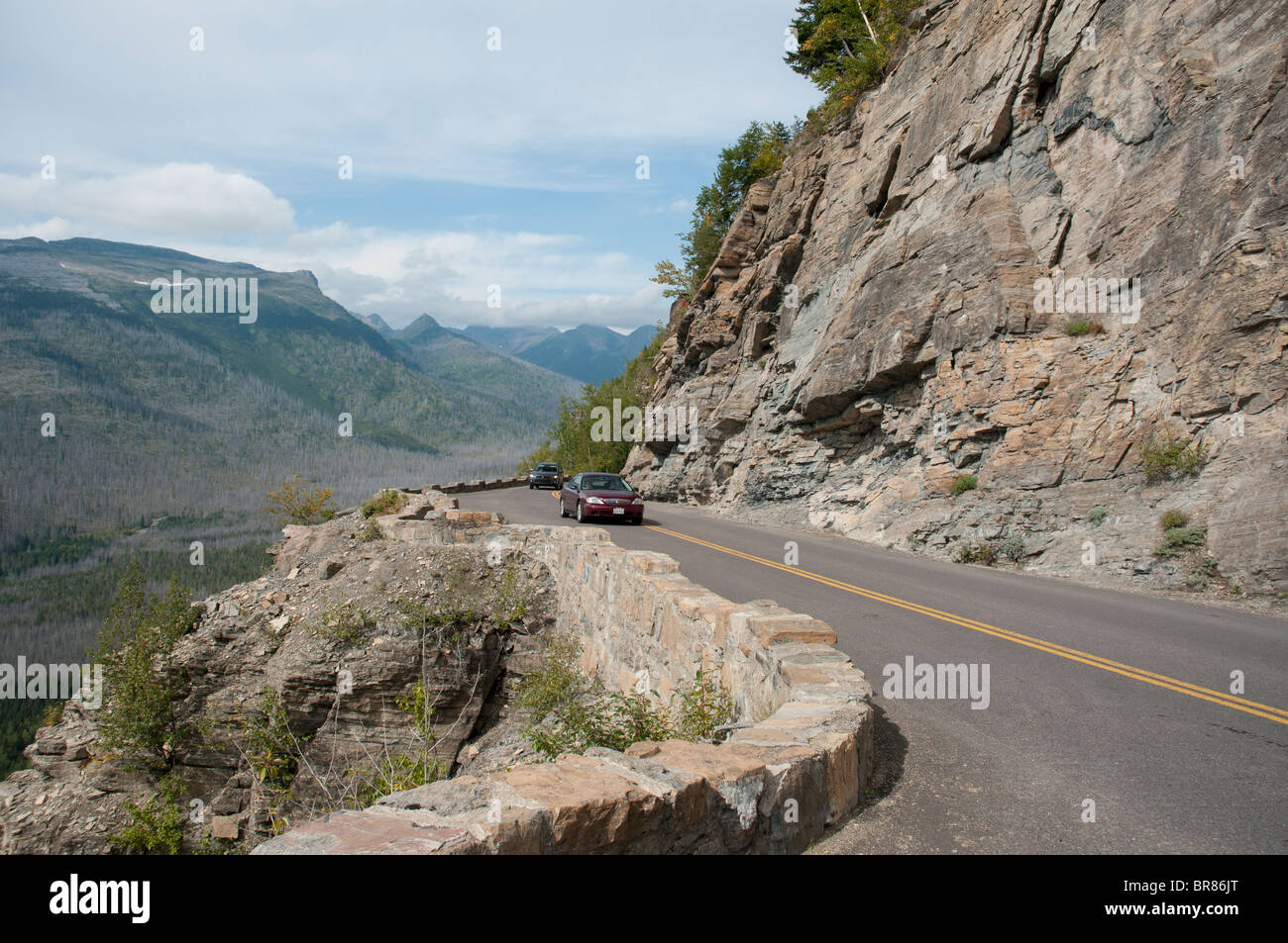 The Going to the Sun Road is a 52 mile long scenic highway that traverses Glacier National Park in Montana. Stock Photo