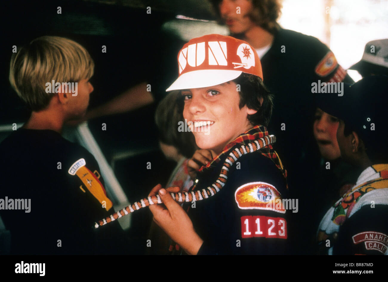 cub scout boy snake play science nature show center smile happy learn enjoy surprise special touch Stock Photo