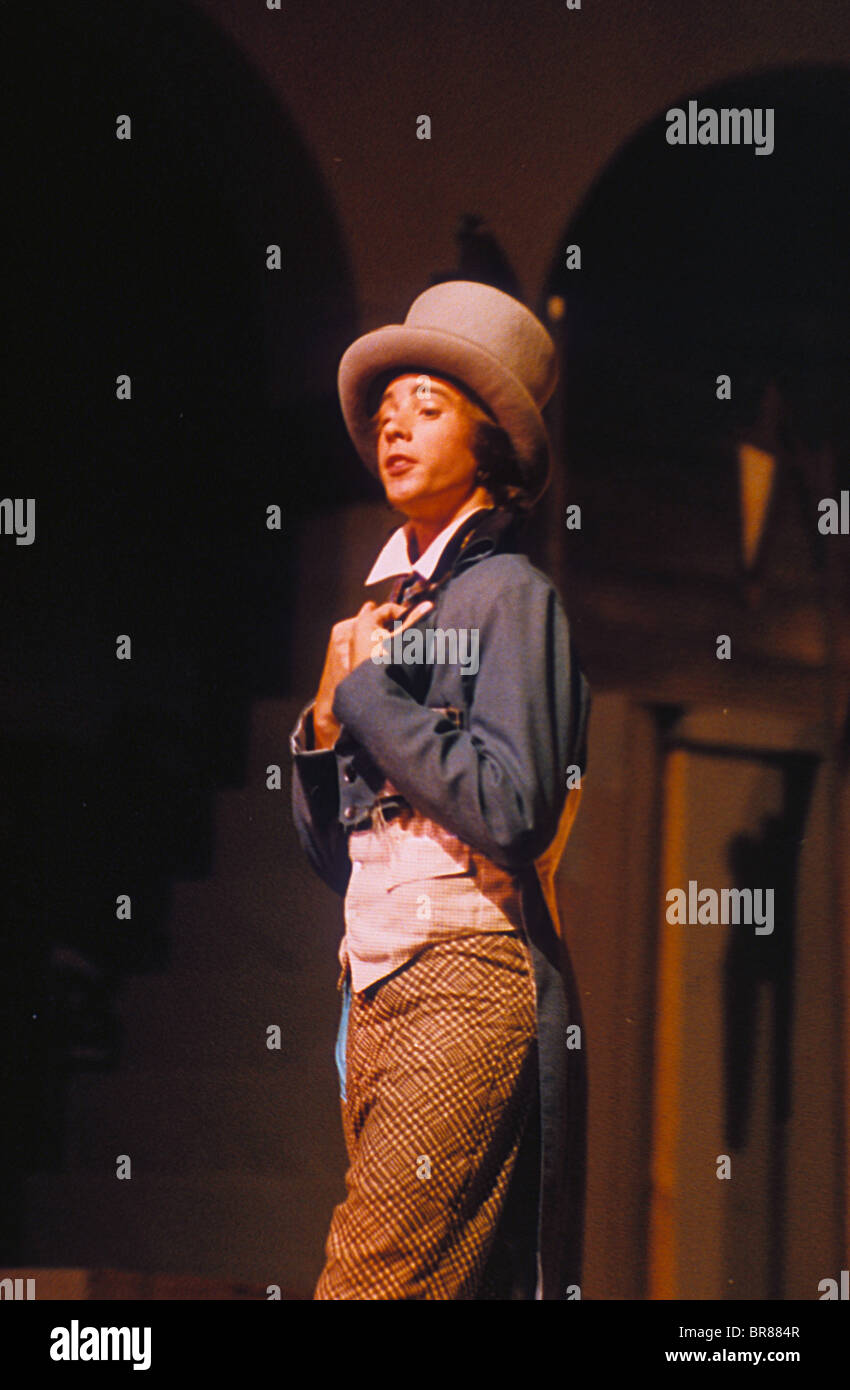 Musical play show Oliver Artful Dodger character costume stage light act  student school production amateur Stock Photo - Alamy