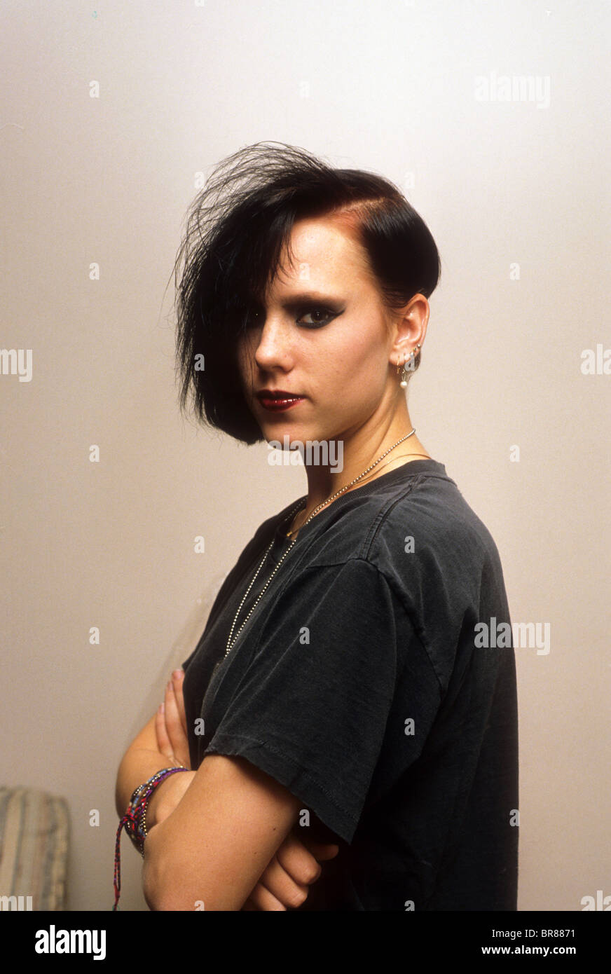 emo rebellious goth teen girl different different ordinary odd strange hair makeup body language rebel anti Stock Photo