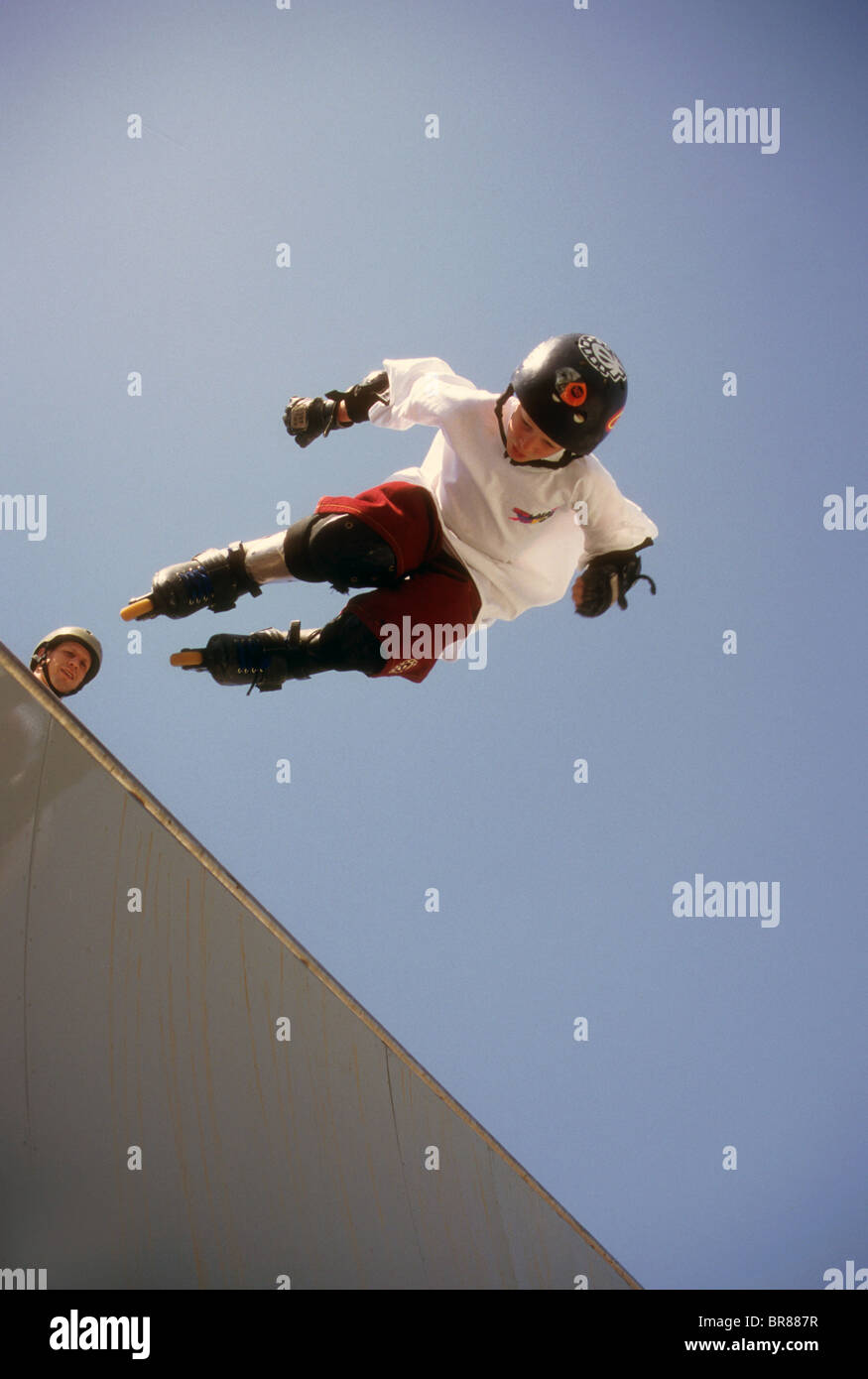 roller blade demonstration sport high ramp helmet safe pad glove high