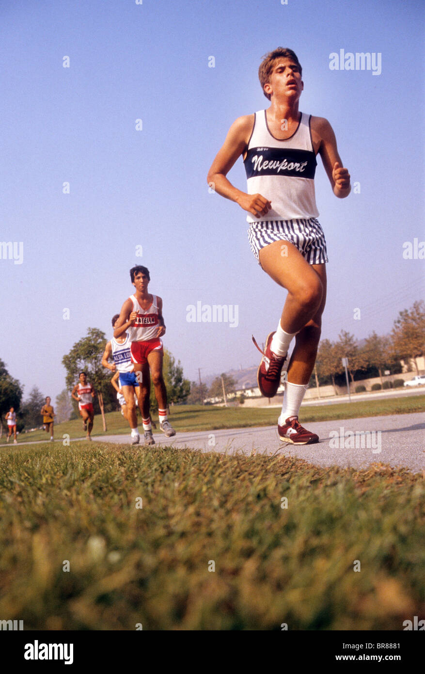 high school boy race run cross country event tired hot weary exhausted ...