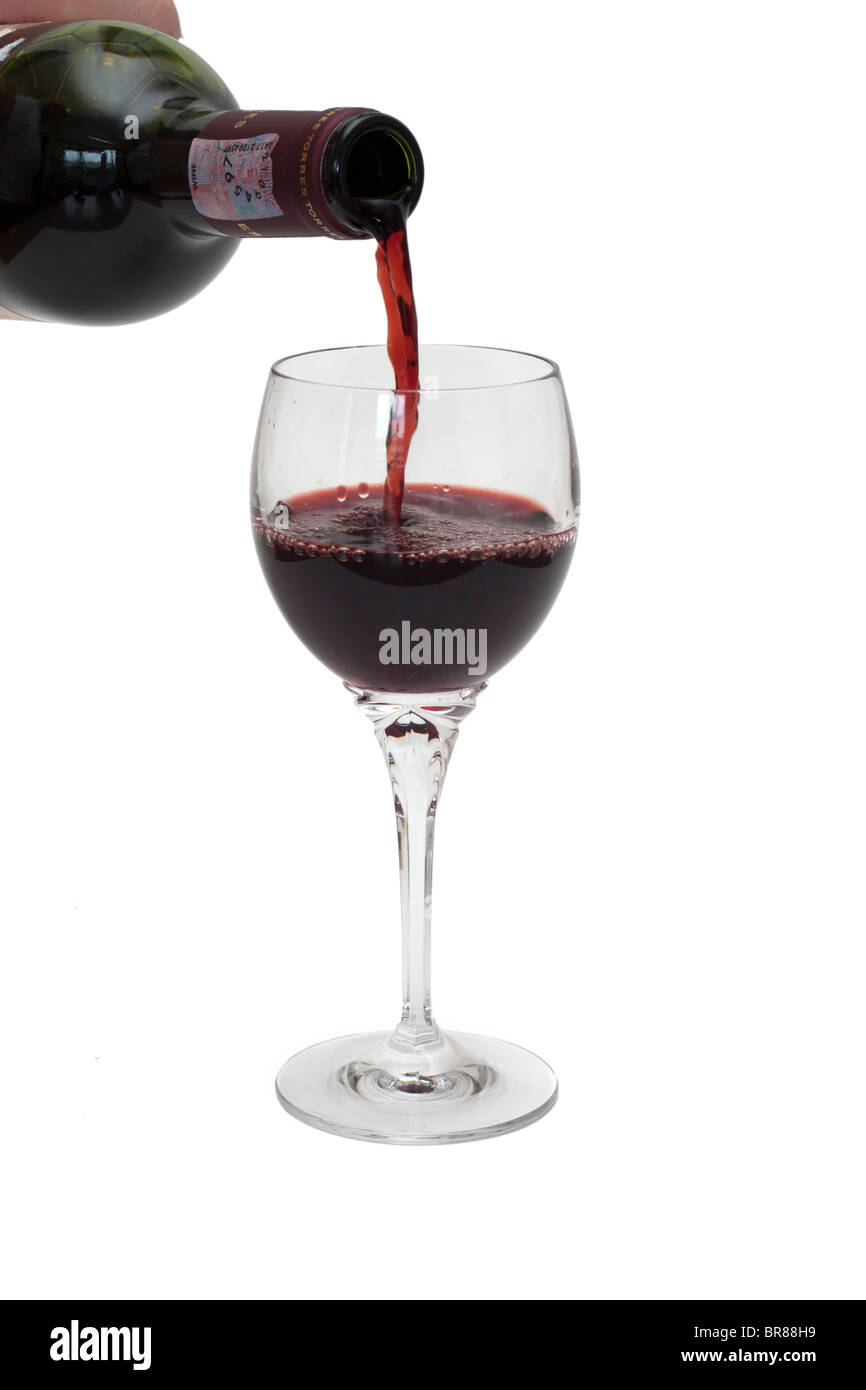 Pouring a glass of red wine Stock Photo
