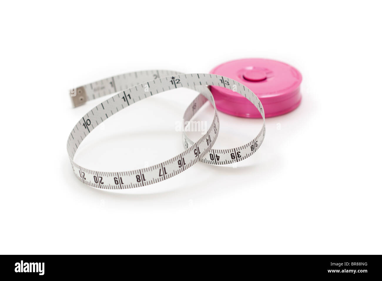 Tape measure with inches and centimeters Stock Photo