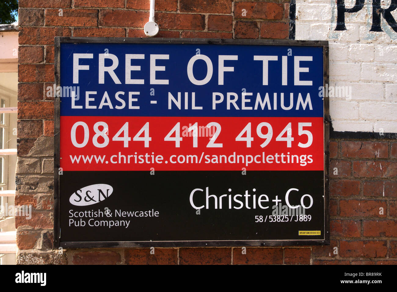 Commercial To Let Sign for a Public House fixed to a Wall, UK Stock Photo