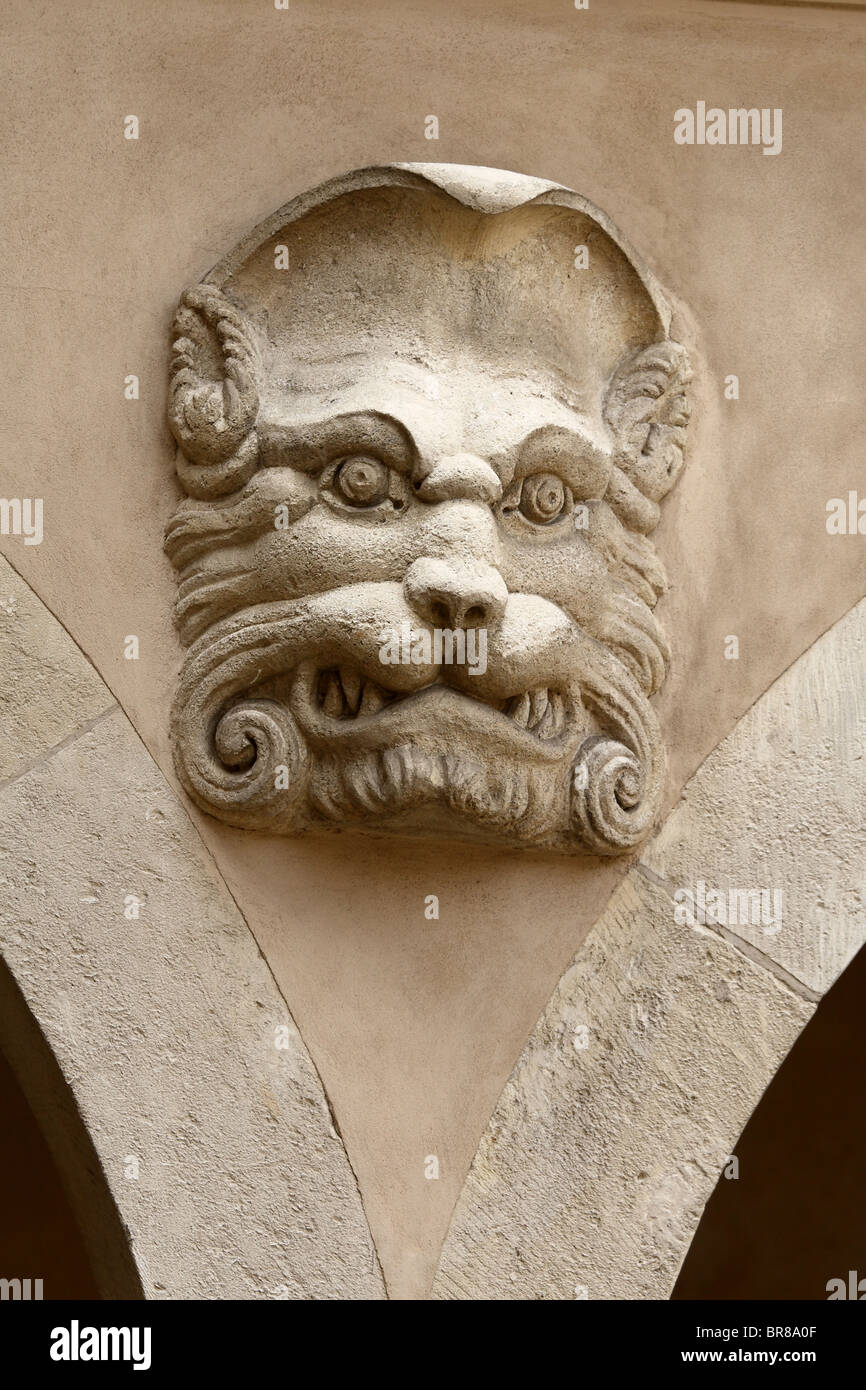 Decorative relief head. Pieskowa Skala Castle. Poland. Stock Photo