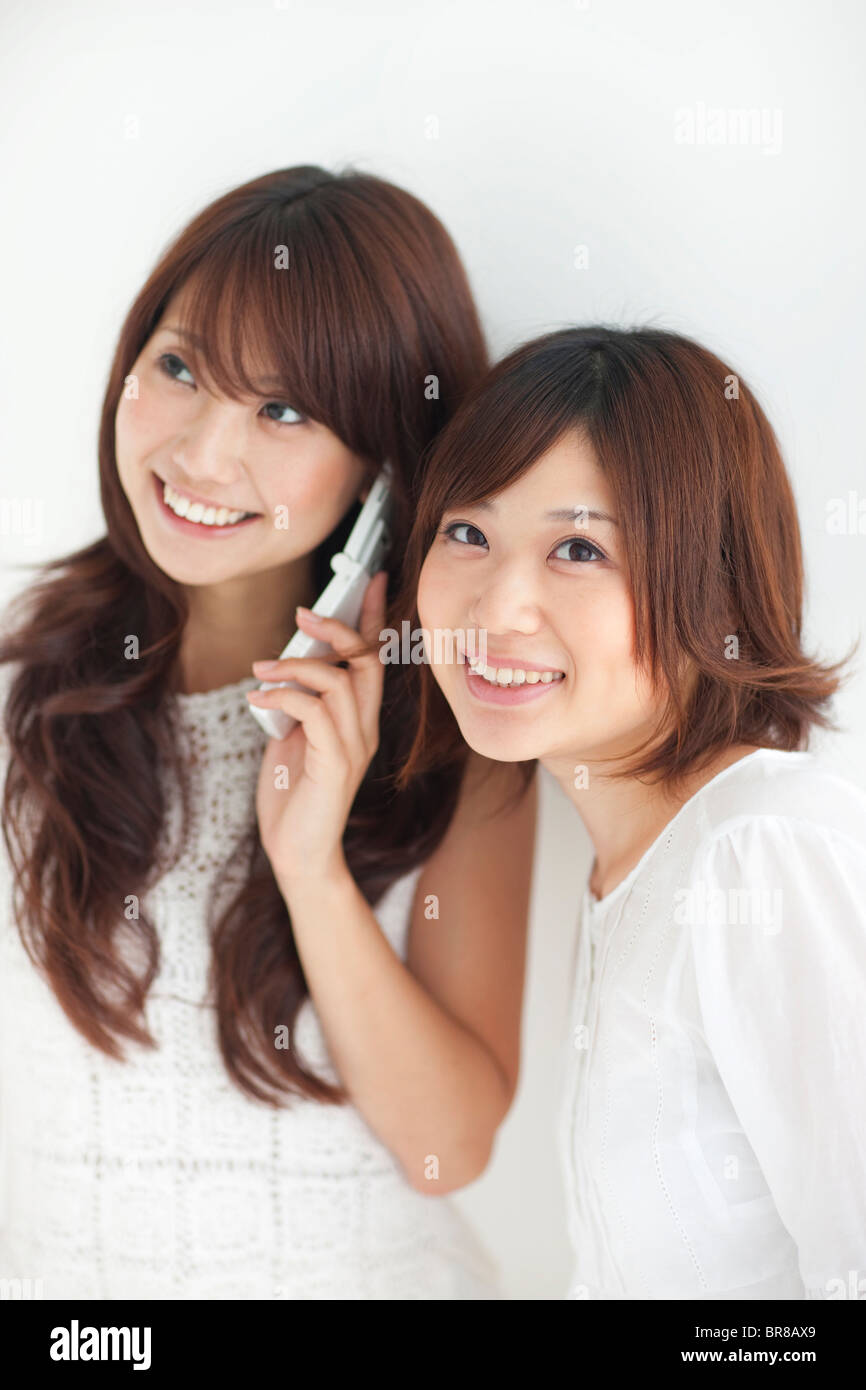 Two women one using hi-res stock photography and images - Alamy